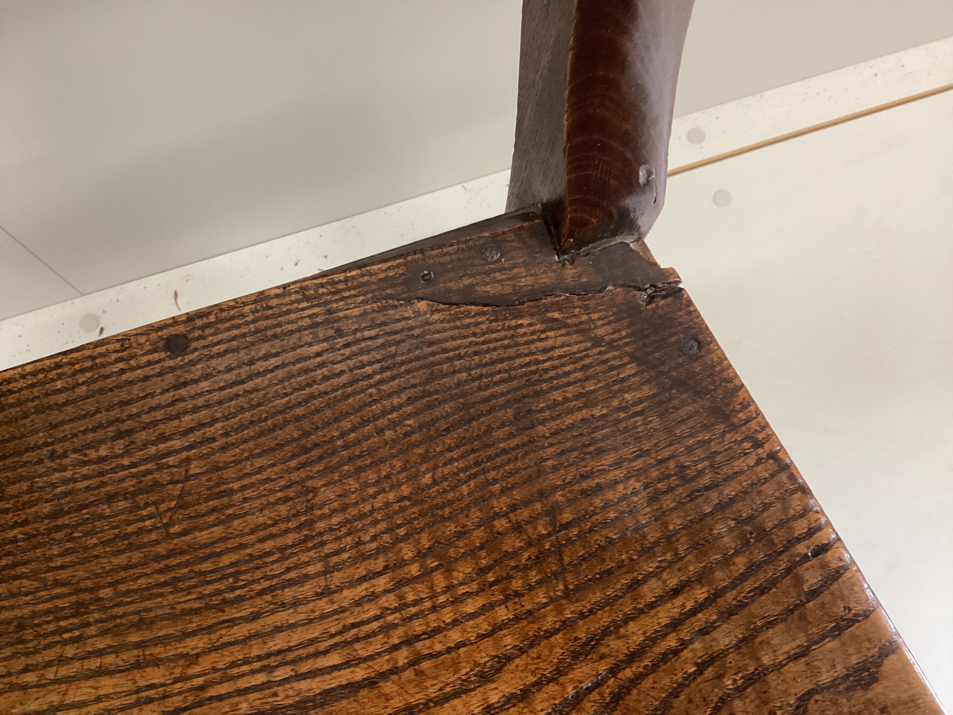 A pair of Regency provincial elm wood seat dining chairs, width 44cm, depth 36cm, height 86cm